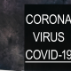 Coronavirus name written on a chalkboard